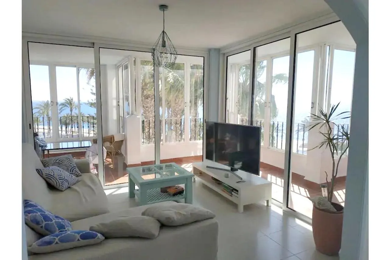 Seaside Retreat: Beachfront House with Pool in Roquetas De Mar Holiday home