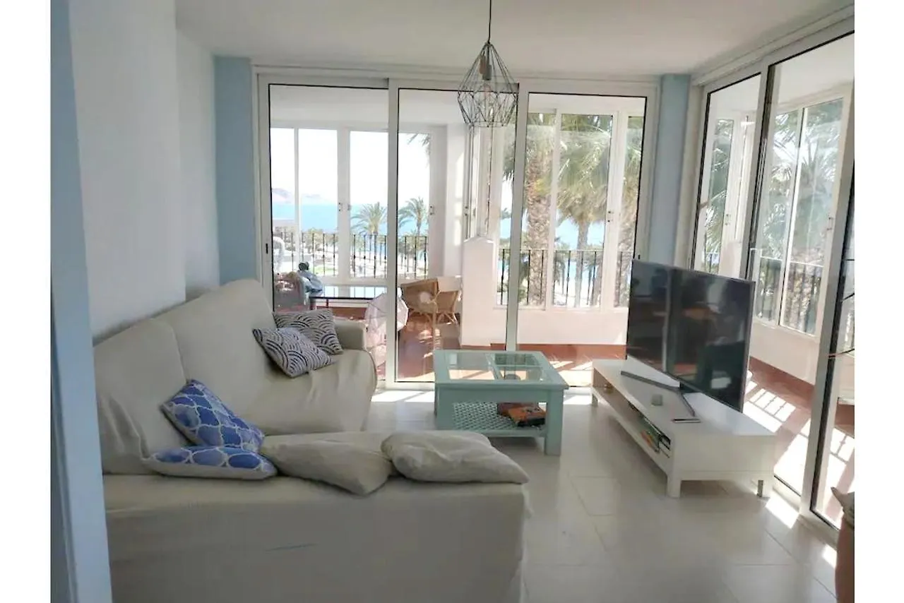 Seaside Retreat: Beachfront House with Pool in Roquetas De Mar Holiday home